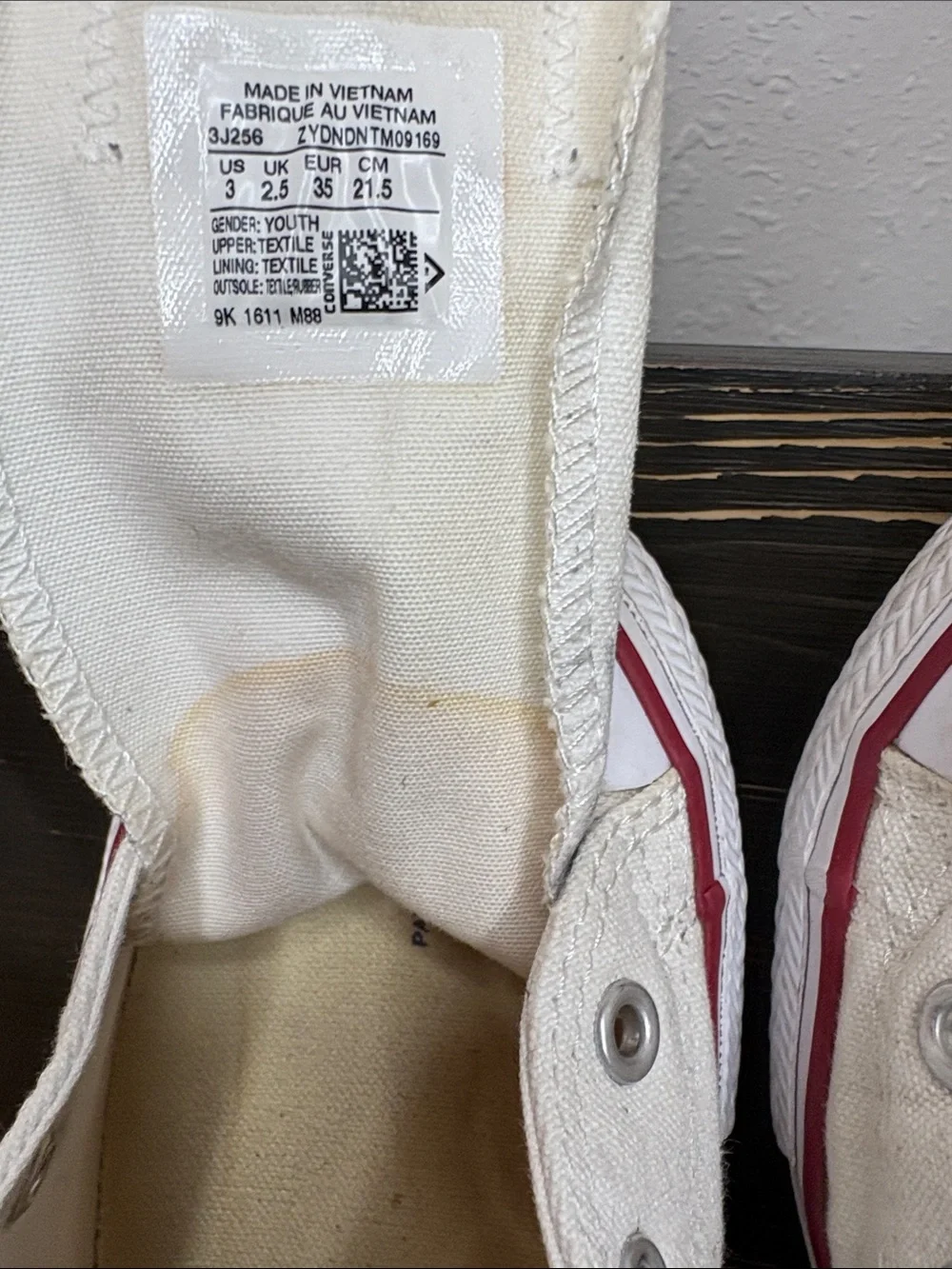Converse Kids Slip-On Canvas Sneakers in Cream with Red Trim